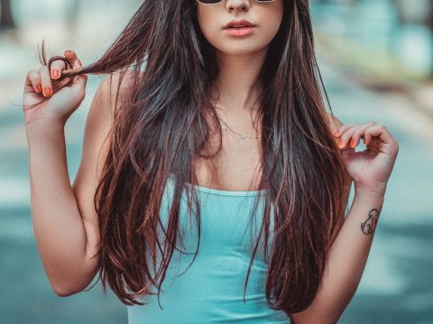 Woman Holding Her Hair